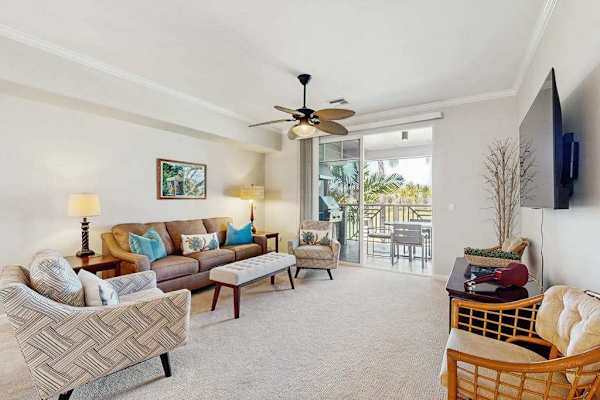 Bright living room with lanai access