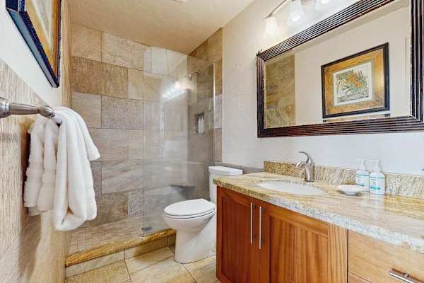 Pristine Modern Bathroom Featuring Elegant Custom Tile Work