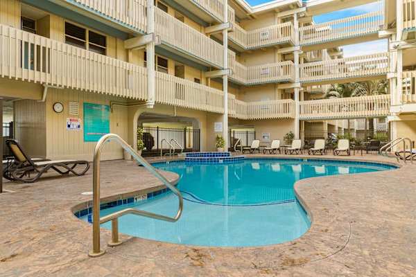 Dive Into Luxury At Our Sunny Oceanside Courtyard Pool