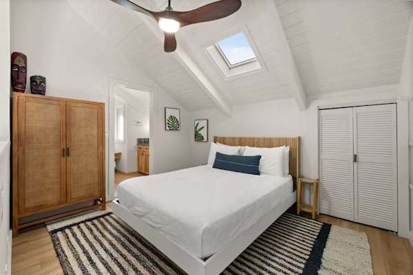 Modern loft bedroom with warm wood accents