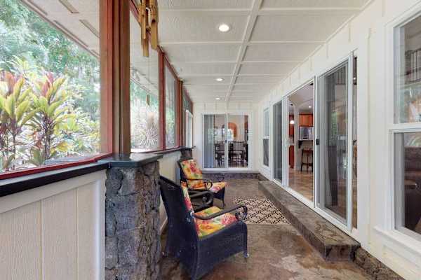 Plenty of seating on the lanai to relax and read a book or sit and dine.