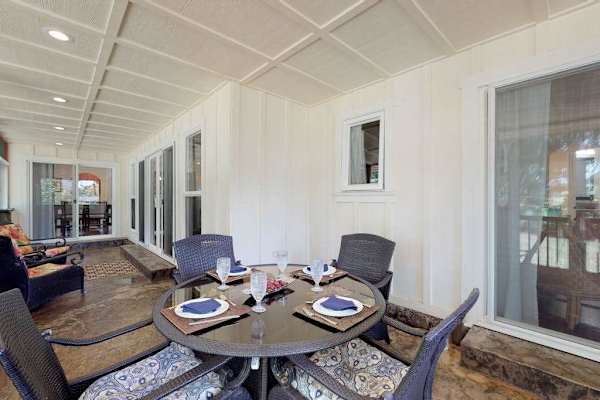 Plenty of seating on the lanai to relax and read a book or sit and dine.