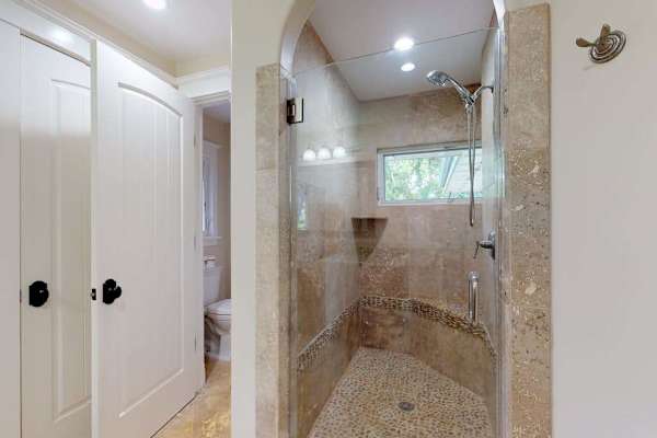 Guest bathroom with walk-in shower.
