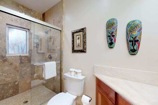 Guest bathroom with tub/shower combo.