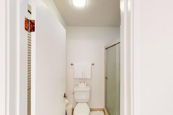 Full bathroom with walk in shower.