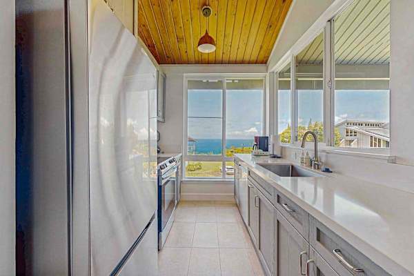 Newly remodeled kitchen with stainless steel appliances.