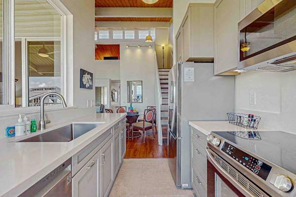 Newly remodeled kitchen with stainless steel appliances.