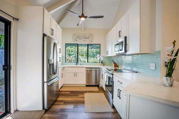 Fully remodeled kitchen with new stainless steel appliances.