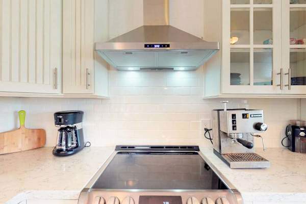 Newly remodeled kitchen with new stainless steel appliances.