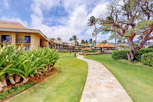 Charming Garden Walkway Through The Resort Grounds