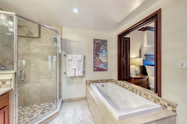 Ensuite Bathroom with Soaking Tub & Glass Walk-In Shower