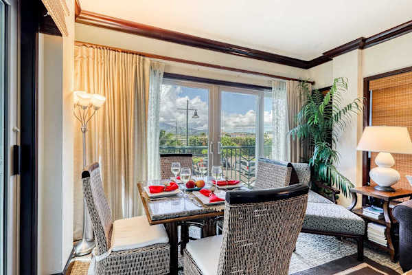 Indoor Dining Area with Seating & Balcony Access