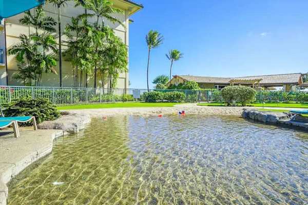 Resort Lagoon Pool with Sandy Shallow Entry & Loungers