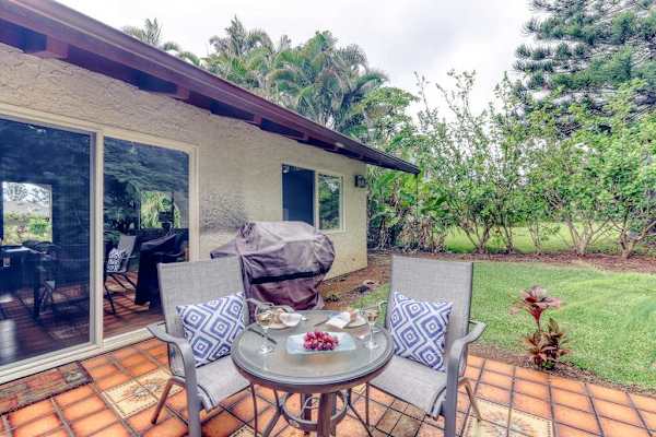 Covered Outdoor Lanai with Seating & Garden Views