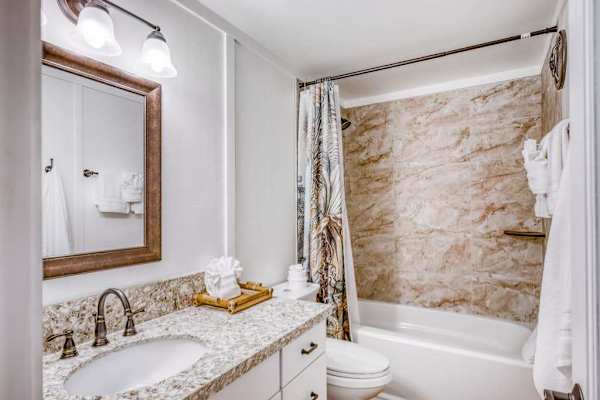 Full Guest Bathroom with Granite Vanity & Soaking Tub