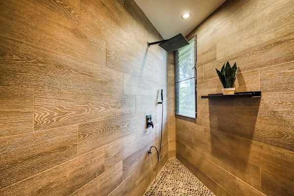 Modern walk-in shower with elegant finishes
