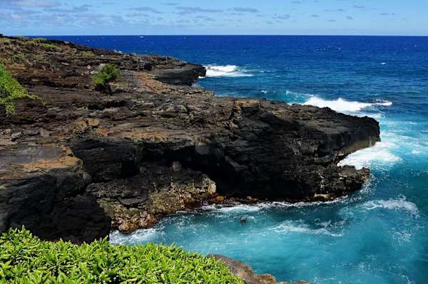 The area is known for its dramatic sea arch and geological formations