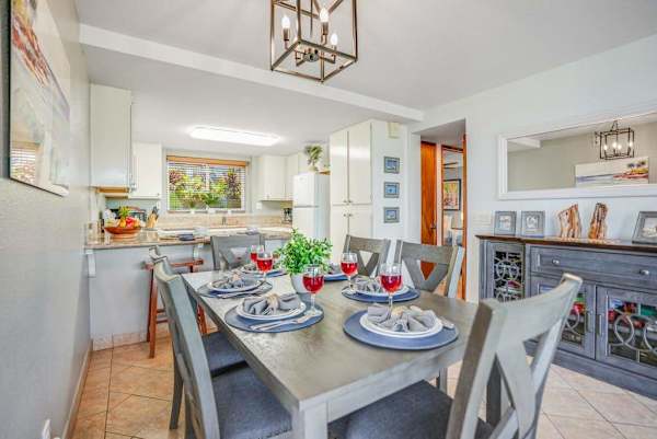 Dining space flows directly into the modern kitchen, keeping everyone connected