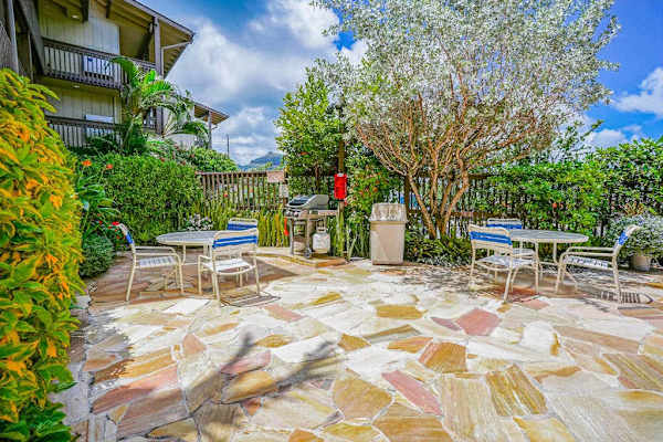 Spacious Backyard with Tropical Landscaping