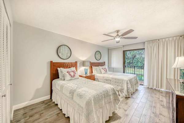 Bright Bedroom With Two Cozy Beds