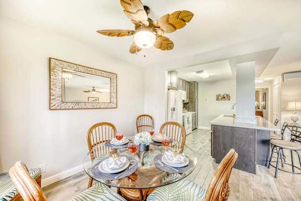 Charming Dining Area With Tropical-Inspired Decor