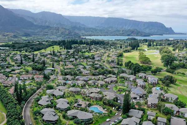 Aerial view highlighting the property's scenic mountain backdrop