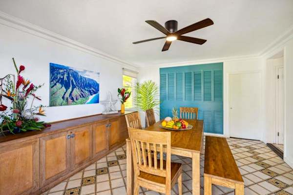 Dining room with table and seating for six.
