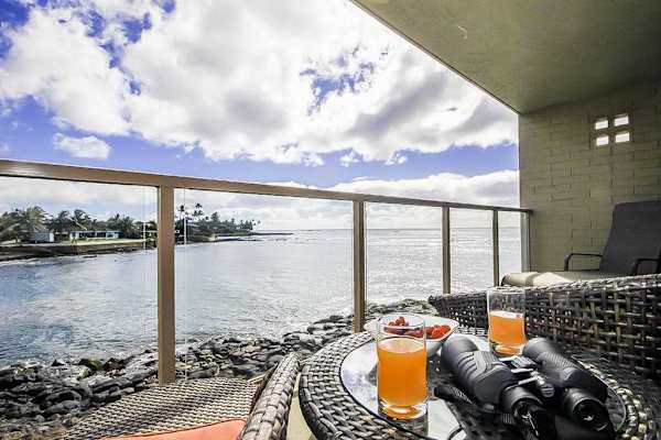 Views of the turquoise waves crashing onto the rocks below from the comfort of your private lanai.