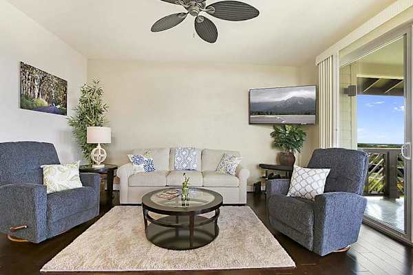 Settle into the bright living room, where you can put your feet up on the couch and two chairs to watch movies on the flatscreen TV. Extra guests? The couch doubles as a queen sleeper sofa. Large picture windows and sliding doors.