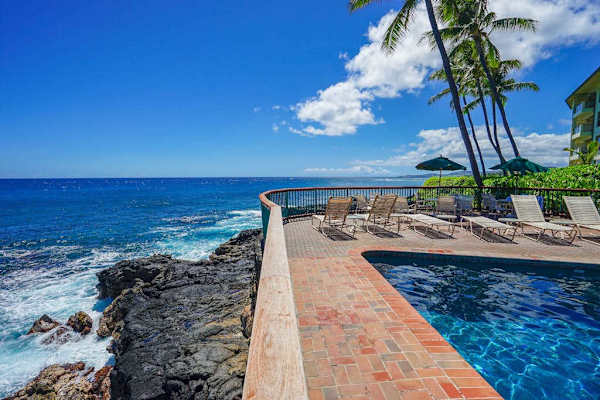 Spend sunny afternoons beside the sparkling pool