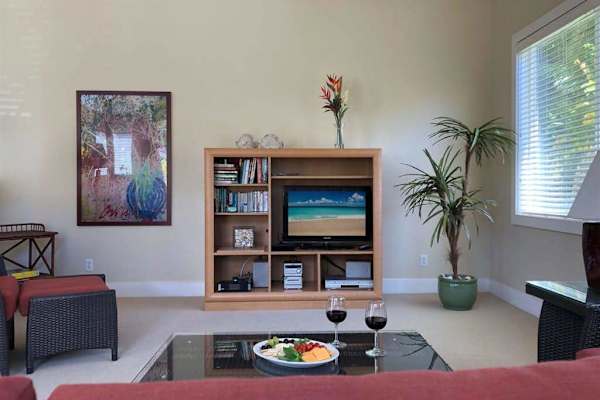 Relax indoors while gentle trade winds flow through the space