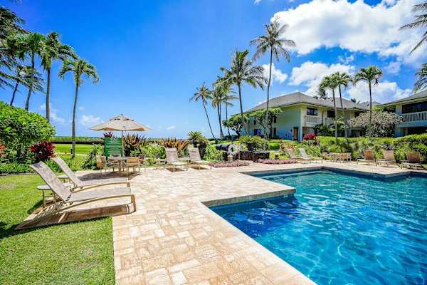 Resort pool with lounge chairs for sunny afternoons