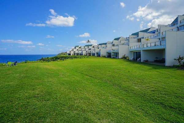 Expansive oceanfront lawn with uninterrupted Pacific views