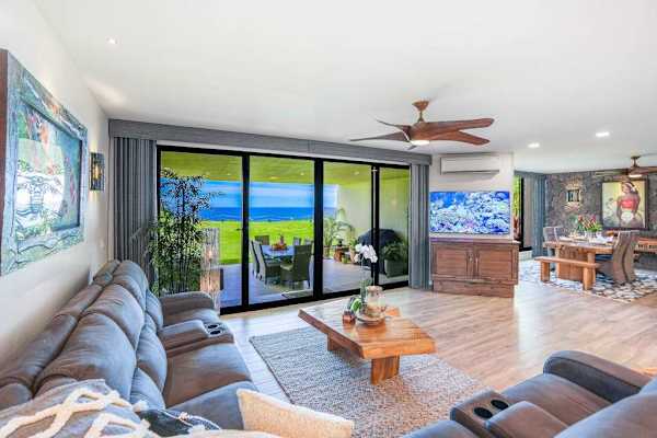 Relax in the living room while enjoying panoramic ocean views