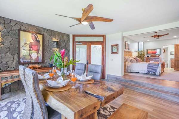 Gather around the dining table in a warm and inviting space