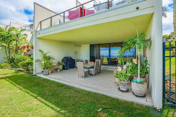Enjoy outdoor dining in a private covered lanai