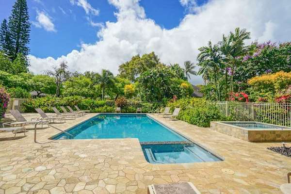 Refresh in the resort pool with the hot tub just steps away.