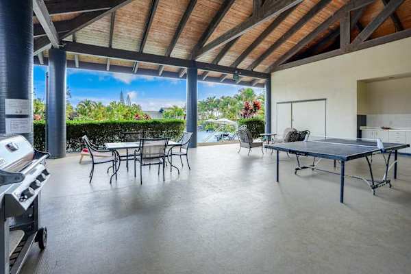 Grill up a meal or play lawn games while the kids splash in the pool, then gather for dinner in the covered outdoor seating area.