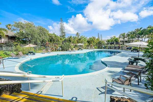 Relax by the largest condo pool on the North Shore, complete with poolside BBQ grills for easy family dining.
