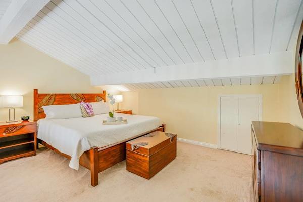 Cozy bedroom provides restful sleeping, soft carpeting, and thoughtful storage