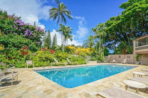 Relax by the resort's sparkling swimming pool.