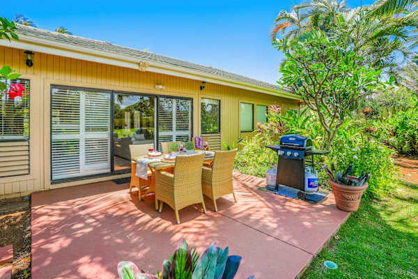Sunny Patio With Tropical Landscaping
