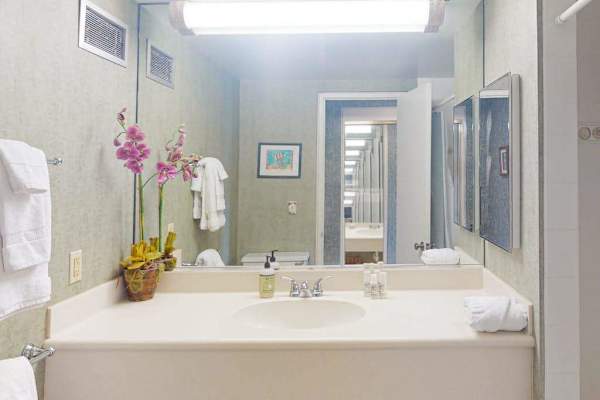 Bright bathroom vanity offers plenty of space for daily routines