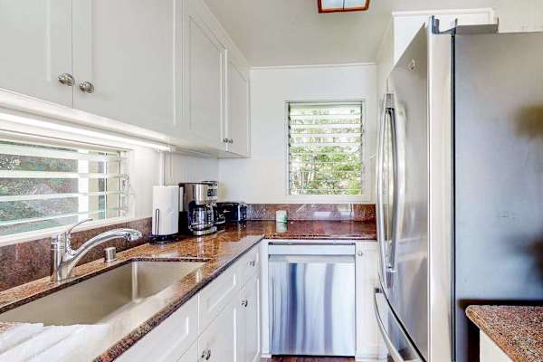 Contemporary kitchen featuring ample storage and modern finishes.