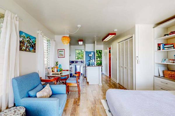 Spacious interior blending sleeping, dining, and living areas seamlessly.