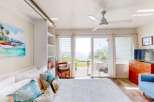 Bright studio with a private lanai and beautiful ocean views.