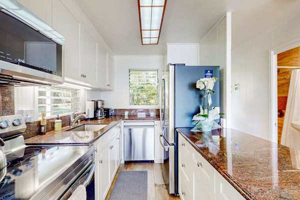 Bright kitchen equipped for preparing meals with ease.