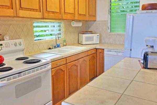 Bright kitchen offering plenty of space to prepare your favorite meals.