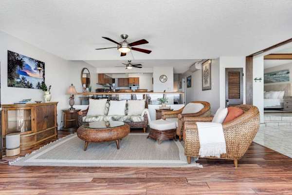 Spacious, cozy living room with warm wood details that make you want to stay
