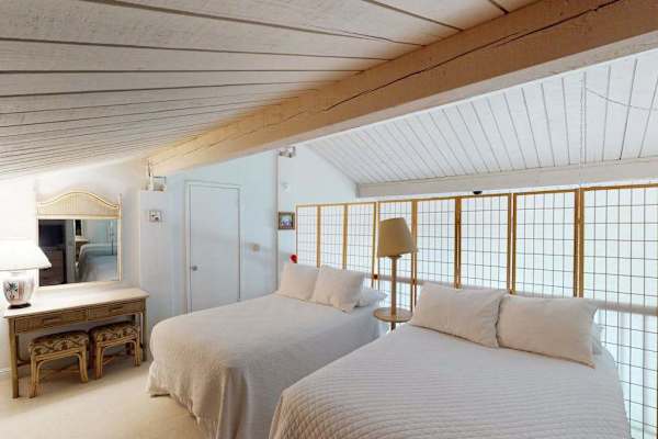 Cozy loft bedroom provides a peaceful space for restful nights